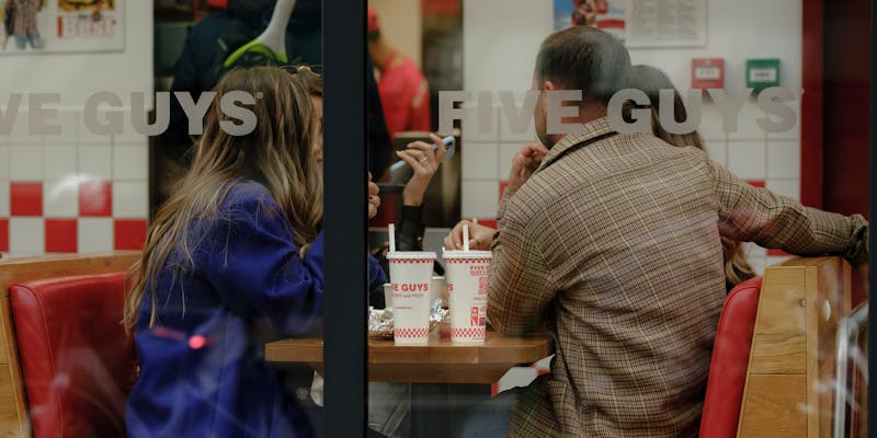 Community dining event with people enjoying food